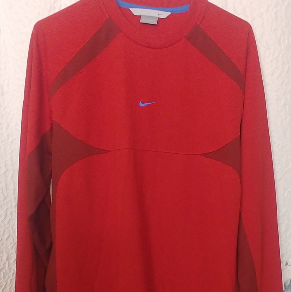 Men's long sleeved red 2 toned Nike Henley. Moisture wick material.